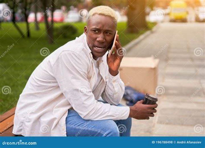 Anxious Man at Phone