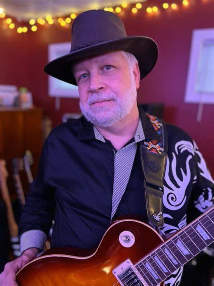 Himself - guitars / tambourine / vocals