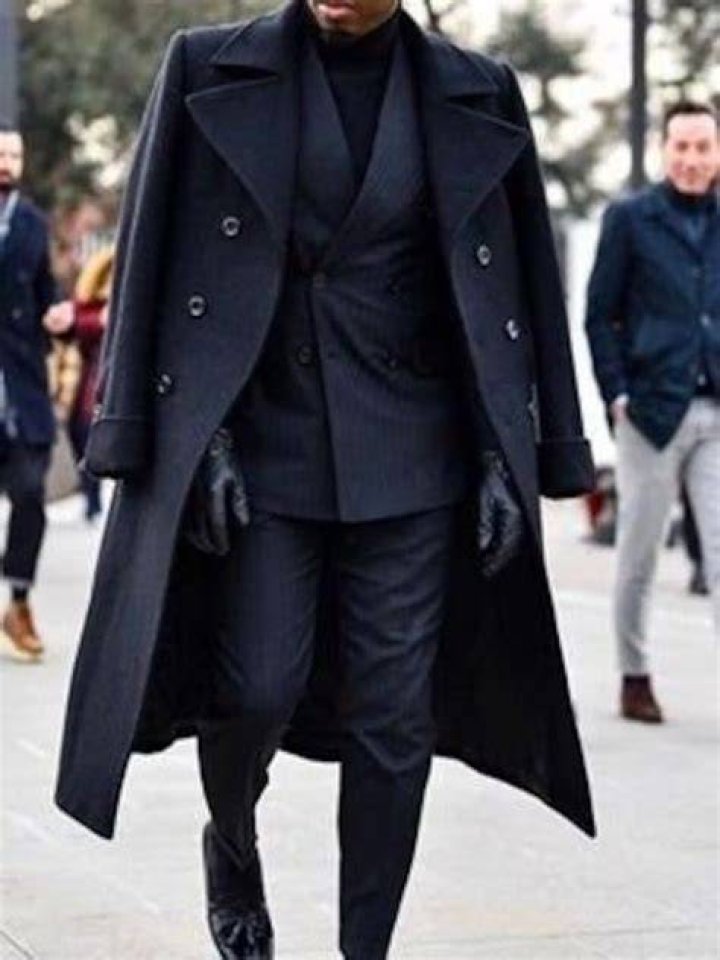 Man in Blue Coat
