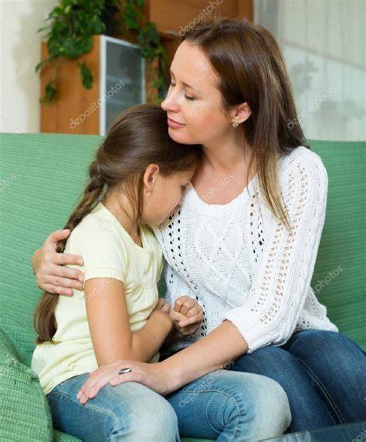 Woman Comforting Child